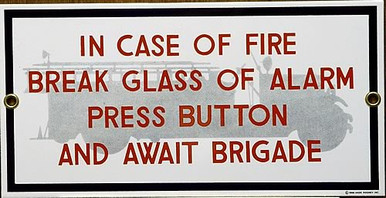 Photo of FIRE BRIGADE PORCELAIN SIGN,  IN CASE OF FIRE BREAK ALARM GLASS, PUSH BUTTON AND AWAIT FIRE BRIGADE SIGN HAS SHARP COLORS AND DETAIL THIS SIGN IS OUT OF PRINT, WE HAVE ONLY ONE LEFT