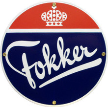 Photo of FOKKER PORCELAIN SIGN, RED, WHITE AND BLUE COLORS WITH A CROWN AT THE TOP AND FOKKER ACROSS THE MIDDLE AND BOTTOM.  NICE DETAILS RICH COLORS