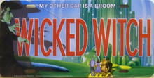 EMBOSSED METAL WIZARD OF OZ LICENSE PLATE (WICKED WITCH)  WITH SLOTS FOR EASY MOUNTING MEASURES 12" X 6"     "MY OTHER CAR IS A BROOM"