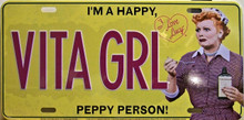 LUCY VITA GRL LICENSE PLATE  "I'M A HAPPY, PEPPY PERSON"  WITH SLOTS FOR EASY MOUNTING  
MEASURES 12" X 6"