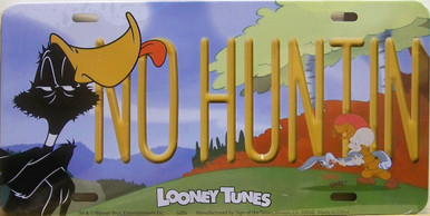 DAFFY DUCK LICENSE PLATE  NO HUNTIN"  MEASURES 12" X 6"  WITH SLOTS FOR EASY MOUNTING