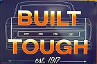 FORD TOUGH TIN SIGN HAS HOLES IN EACH CORNER FOR EASY MOUNTING  MEASURES 17  3/4"  X  11  13/16"