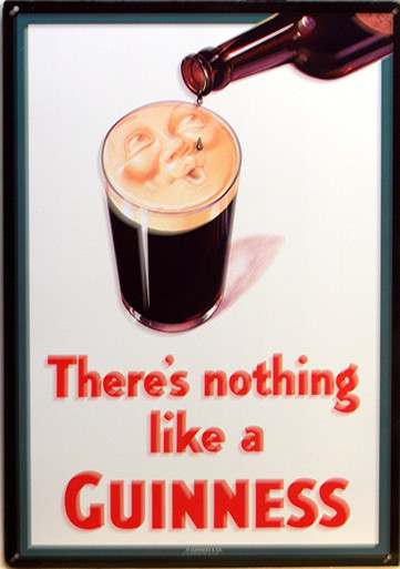 GUINNESS TIN SIGN WITH HOLES IN EACH CORNER FOR EASY MOUNTING.
