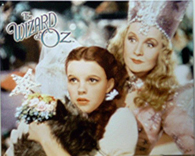 Photo of WIZARD OF OZ WITH DORTHY TOTO AND GLINDA, THIS TIN SIGN IS OUT OF PRINT AND WILL BE GONE SOON