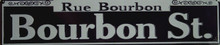 BLACK AND WHITE BOURBON STREET, STREET SIGN MEASURES 24" W X 5" H
AND HAS HOLES FOR EASY MOUNTING