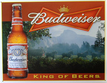 Photo of BUD KING OF BEERS SIGN WITH THE CLYDESDALES PULLING THE WAGON THROUGH THE MORNING MIST, GREAT COLOR AND DETAIL