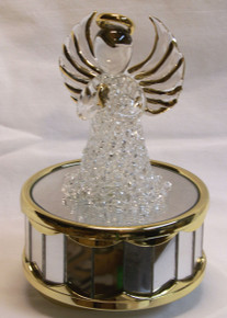 GLASS ANGEL CAROUSEL PLAYS AMAZING GRACE 
3 5/8" X 3 5/8" X 6" HAND CRAFTED & HAND PAINTED