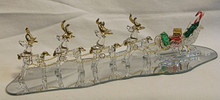 FOUR GLASS REINDEER PULLING SLEIGH ON MIRROR 
22K GOLD TRIM 10 1/2" X 3 1/2" X 2 3/8" 
HAND CRAFTED & HAND PAINTED