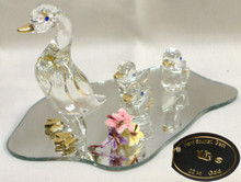 GLASS DUCK WITH BABY DUCKS ON MIRROR 22K GOLD TRIM 
5" X 3 1/8" X 2 3/4" HAND CRAFTED & HAND PAINTED