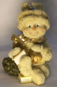 FROSTED SNOWPERSON W/BELL, BOOKS & TREE 
3 1/4" X 2 1/2" X 4 1/2"