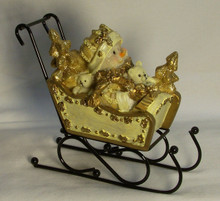SNOWBABY IN SLEIGH WITH METAL RUNNERS 
5 3/8" X 2 1/2" X 4 1/2"