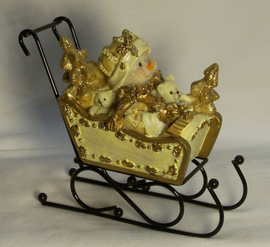 SNOWBABY IN SLEIGH WITH METAL RUNNERS 
5 3/8" X 2 1/2" X 4 1/2"