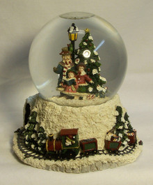 MUSICAL SNOW GLOBE CAROLERS, SUROUNDED BY TOY TRAIN AT BASE PLAYS SANTA CLAUS IS COMING TO TOWN (3) 
ONLY THREE LEFT  5" X 5 1/4" X 6 1/8"