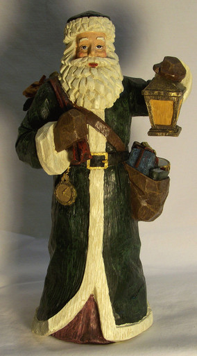 SANTA IN LONG GREEN COAT W/LANTERN & BAGS OF TOYS (2) 5 1/4" X 5 5/8" X 10 1/4"  ONLY TWO LEFT