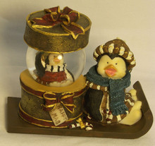 PENGUIN ON SLEIGH WITH MINI SNOW GLOBE 
(TOP COMES OFF HAT BOX)   4 1/4" X 2 3/8" X 3 3/4"