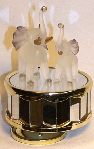 MOTHER & BABY ELEPHANT CAROUSEL PLAYS MEMORY - HAND CRAFTED (1)  ONLY ONE LEFT  
MEASURES 3 5/8" X 3 5/8" X 4 1/8"