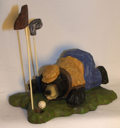 BEAR GOLFER "ENCOURAGING THE BALL TO DROP" 
MEASURES 6 1/2" X 4 1/2" X 5 3/4"  RESIN WOOD CARVED LOOK