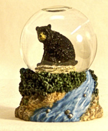 MINI GLITTER GLOBE BEAR SITTING
 MEASURES 2" X 2" X 2 5/8" 
RESIN WOOD CARVED LOOK ONLY THREE LEFT