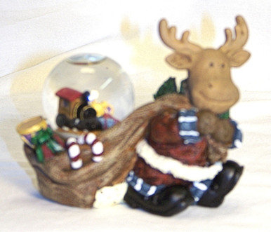 MINITURE SNOW GLOBE REINDEER W/SACK OF TOYS 
MEASURES 4 1/4" X 2" X 3 5/8"