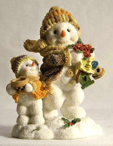SNOW CHILDREN ON THEIR WAY TO FEED THE BIRDS 
MEASURES 3 3/8" X 2 1/4" X 4 1/2"