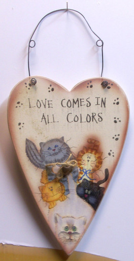 LOVE COMES IN ALL COLORS MEASURES 6 3/8" X 1/4" X 12 7/8" INCLUDING WIRE