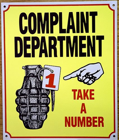 Photo of COMPLAINT DEPARTMENT SIGN, YUP, GO AHEAD TAKE A NUMBER