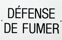 Photo of DEFENSE DE FUMER PORCELAIN SIGN IS FRENCH FOR GAS MASK..