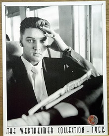 Photo of ELVIS GOING HOME BLACK AND WHITE SIGN SHOWS HIM RETURNING FROM THE ARMY ON A BUS