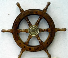 Photo of 12? SHIPS WHEEL, BEAUTIFULLY CRAFTED OF SOLID WOOD AND BRASS, MAKES A GREAT DECORATION OR CAN BE USED FOR MAKING A PLAQUE FOR YOUR FAVORITE NAUTICAL ENTHUSIAST
