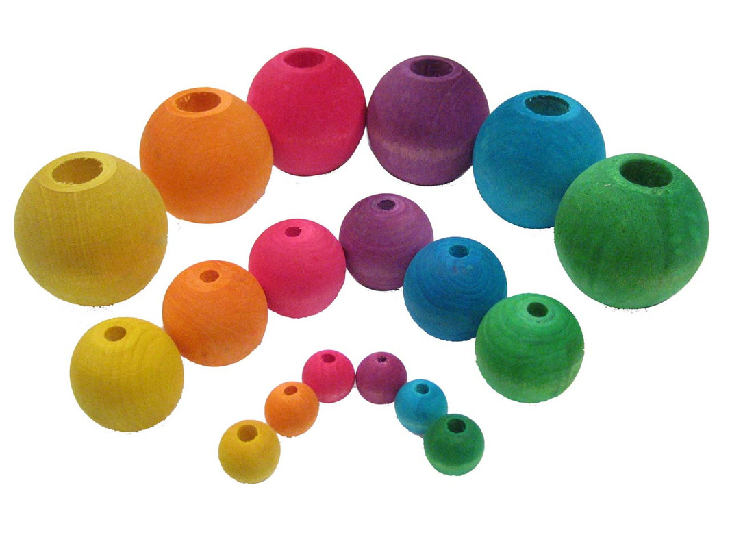 The three sizes of Round Wood Beads shown together