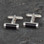 Contemporary sterling silver and Whitby Jet barrel cufflinks with T bar fastening