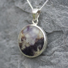 Round Derbyshire blue john pendant on sterling silver chain