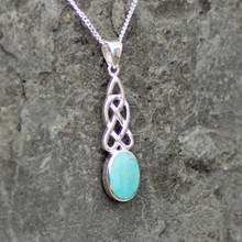Oval stone Kingman turquoise and sterling silver Celtic pendant
