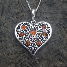 Large sterling silver filigree heart pendant with cognac amber cabochons