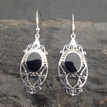 Long sterling silver filigree earrings set with oval Whitby Jet stones