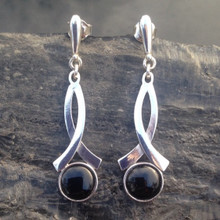 Long sterling silver crossover ribbon drop earrings with round Whitby Jet cabochons