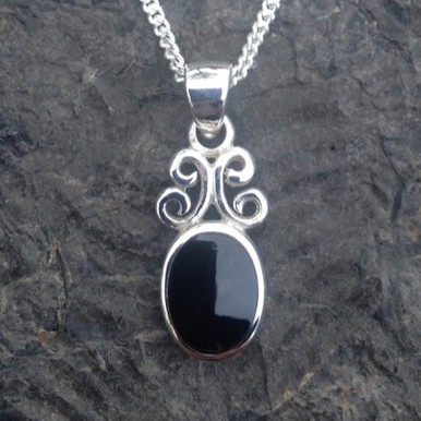 Small sterling silver scroll necklace with hand carved oval Whitby Jet 