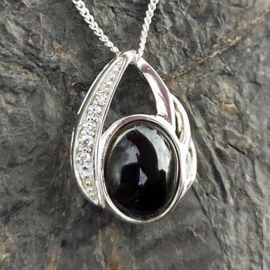Fancy sterling silver Whitby Jet cubic zirconia asymmetrical pendant with oval stone