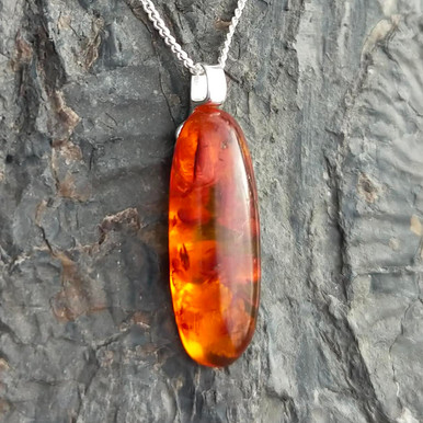 Natural Baltic cognac amber drop pendant on sterling silver curb chain