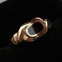 Handmade 9ct yellow gold ring with elongated Whitby Jet stone and twist shoulder