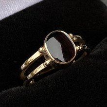 Contemporary 9ct gold parallel split shank ring with oval Whitby Jet stone