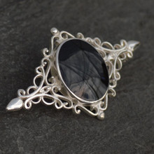 Large sterling silver filigree brooch with oval Whitby Jet stone