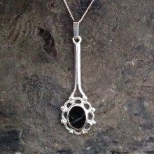 Long sterling silver necklace with oval Whitby Jet stone and frill and bead edge