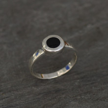 Contemporary sterling silver ring with circular Whitby Jet stone