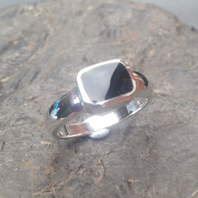 Sterling silver ring with hand carved rectangular Whitby Jet stone
