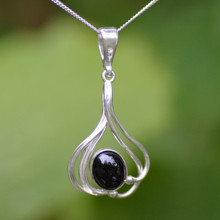 Large contemporary fluid sterling silver pendant with oval Whitby Jet cabochon