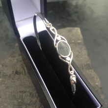 Sterling silver Celtic bangle with small oval Whitby Jet stone