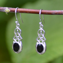 Hand crafted 925 silver Celtic inspired dangly earrings with oval Whitby Jet
