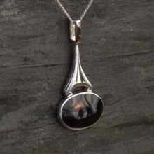 Large contemporary sterling silver pendant with large oval Whitby Jet stone