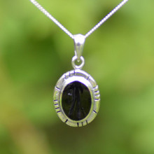 Oval textured edge Whitby Jet and sterling silver pendant